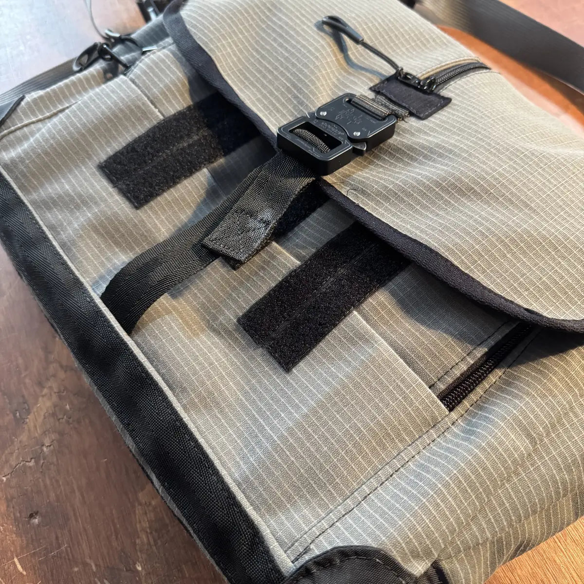 Cobra buckle and flap closure